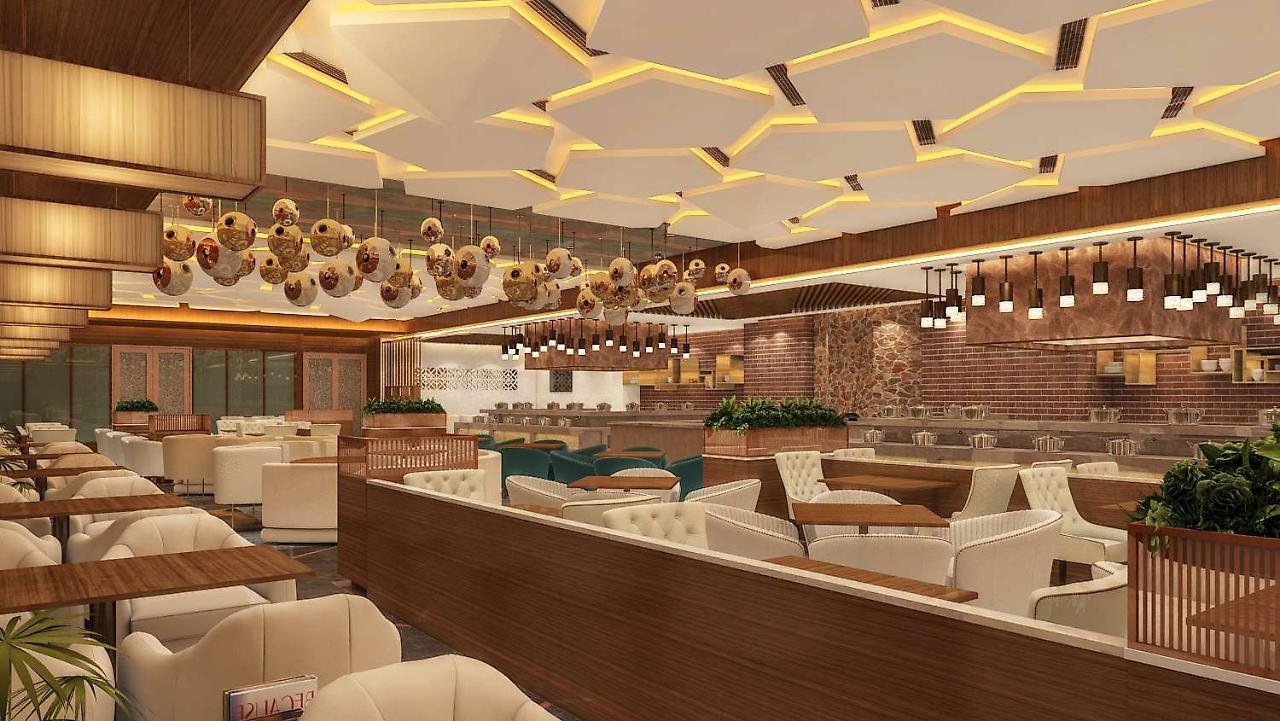 Hotel Radisson Blu Towers Kaushambi Delhi Ncr Ghaziabad Zewnętrze zdjęcie Interior of a restaurant