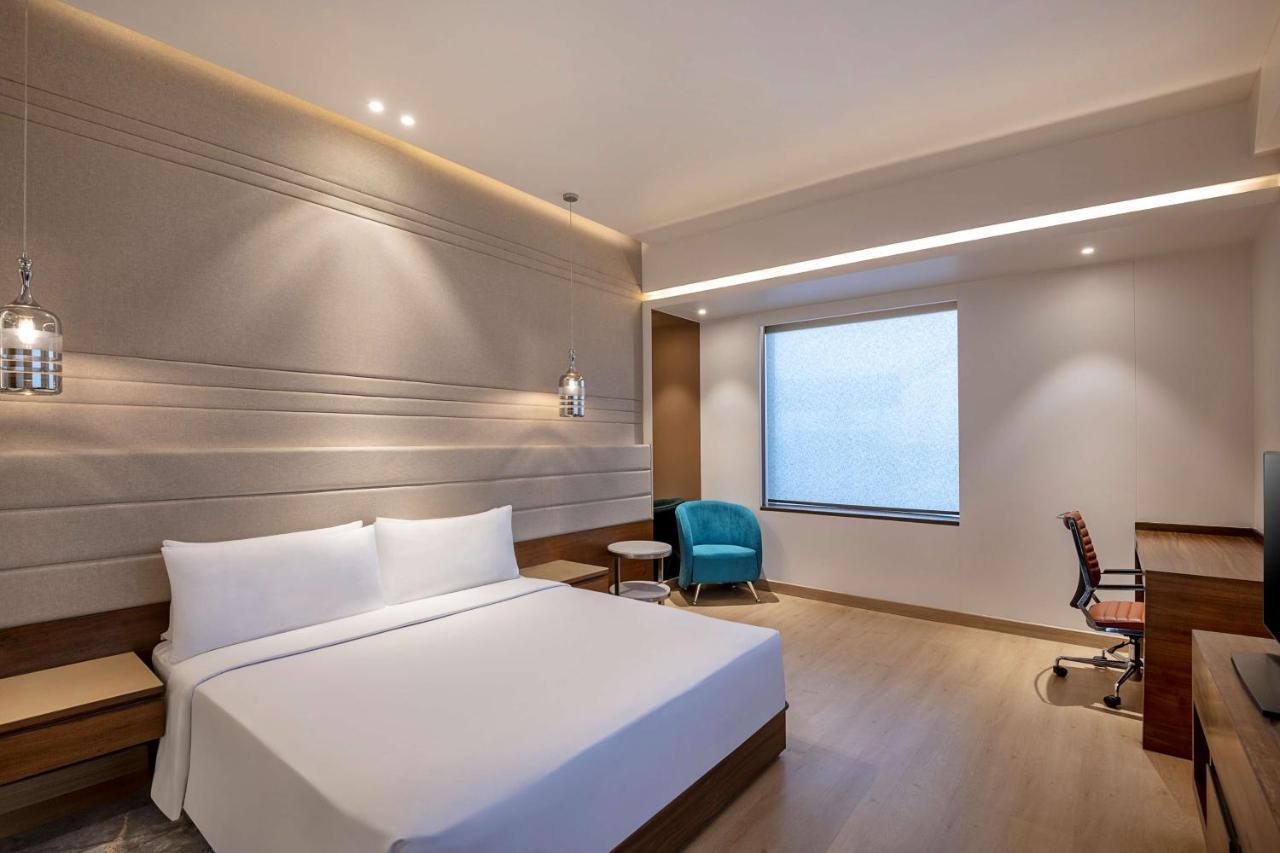 Hotel Radisson Blu Towers Kaushambi Delhi Ncr Ghaziabad Zewnętrze zdjęcie A room at the hotel